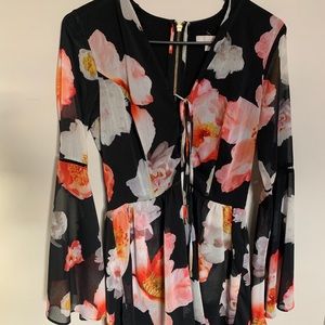 BLACK FLORAL ROMPER WITH FLARE SLEEVE